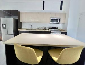 Eshae Living - Stylish 2BR Condo