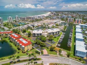 Waterfront Condo - Huge Pool & Across from Beach