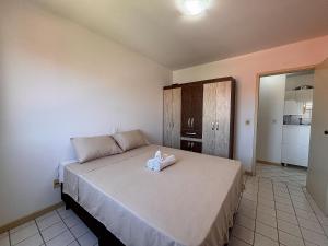 Apê com AC, Garagem | 250m Praia de Canasvieiras