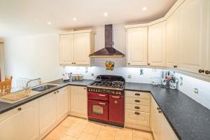 Central to town, 4 bedrooms, sleeps 8, parking for 4 plus cars