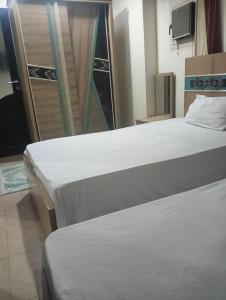 شقه فندقيه بأرقى مناطق المهندسين