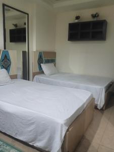 شقه فندقيه بأرقى مناطق المهندسين