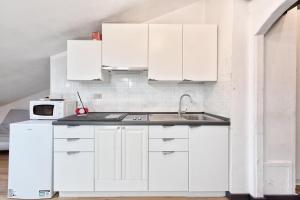 Rooftop Heaven, Mini Attico vicino alla stazione