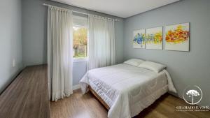 Casa com piscina 3 suítes a 15 min Centro Gramado