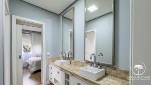 Casa com piscina 3 suítes a 15 min Centro Gramado