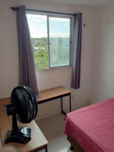 Apartamento completo em condomínio com piscina próximo a praia