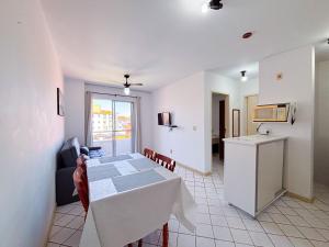 Apê com AC, Garagem | 250m Praia de Canasvieiras