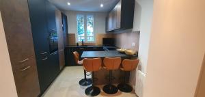 Superbe logement au style Londonien Avec Cinema Ideal pour des grandes familles et professionnels