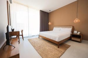 Semesta Sembilan Villa - A Modern Tropical Escape