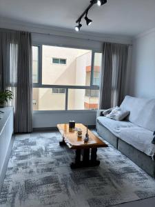 Apto Vista Mar, 10 minutos da Roda Gigante com Garagem