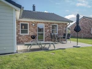 Ferienhaus Charlie mit Terrasse und Kamin