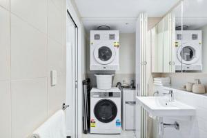 Poolside at 28 Luxe Newstead Apartment Work-Relax-Play