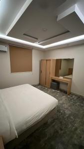 شقة بغرفتينن نوم وصالة بدخول ذكي