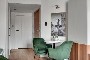 DEO PLAZA Suites & Riverside by Downtown Apartments