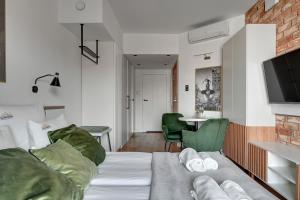 DEO PLAZA Suites & Riverside by Downtown Apartments