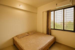 New Spacious 2BHK apartments in Tirupati Near Railway Station with fully equipped kitchen, AC bedrooms, Washing Machine, 24 hours water, caretaker service, and ample space for car parking & ideal for families and pilgrims