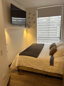 Soul Santa Bárbara, Top location, Caminando al Centro Comercial Unicentro, Suite de 20mts2, Cómoda cama Queen Size, Netflix y Wifi de fibra óptica con Coworking y Gym en el edificio