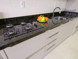 Apto c churrasqueira a 700m da praia MU3731