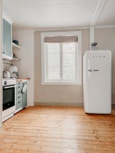 Cozy wooden house with wood stove in Småland