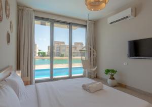 Breezy Lagoonfront Escape 3BR with Private Pool I Tawila El Gouna