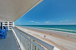 Direct oceanfront corner penthouse with huge wrap-around balcony offering beach and pool views