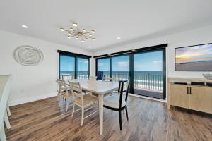 Direct oceanfront corner penthouse with huge wrap-around balcony offering beach and pool views