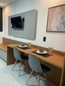 Studio na praia Piscina, academia e lavanderia