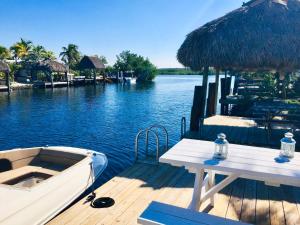 Waterfront Tiny Home w Pool, Beach, Dock, Kayaks