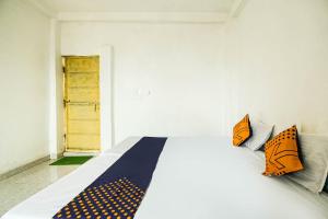 SPOT ON by OYO Krishna Market And Lodge