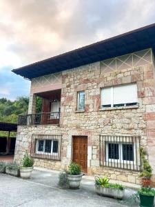 Apartamentos y Pensión El Campanu