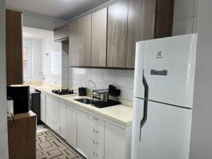 Apartamento Pé na Areia - Frente Mar - Varanda Gourmet