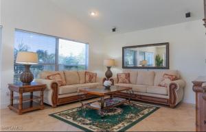 Sunshine paradise retreat with heated pool and canal access