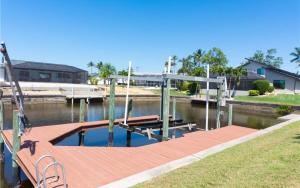 Sunshine paradise retreat with heated pool and canal access