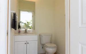 Sunshine paradise retreat with heated pool and canal access