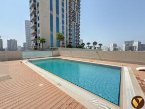 Vogue One Bedroom Apartment with balcony, access to amazing Pool, Kids Area, located Jumeirah Village Circle JVC