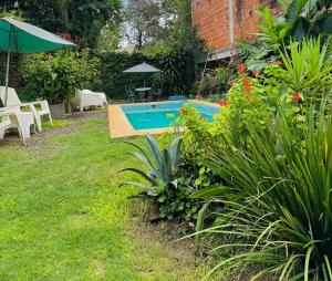 Apart Pequeño Loft con piscina compartida en Cataratas para 2 personas