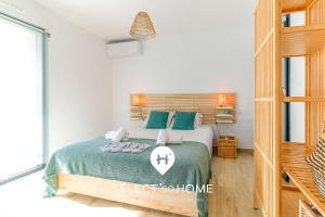 SELECTsoHOME - Joli appartement avec jardin privatif et parking - CAPNAT-F08