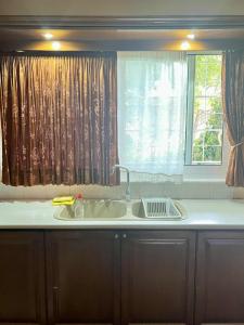 Vintage house overlooking the statue of Leonidas