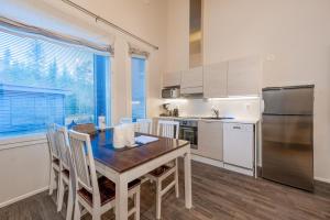 Aurinkorinne 4 - Modern ski-in ski-out apartment with sauna