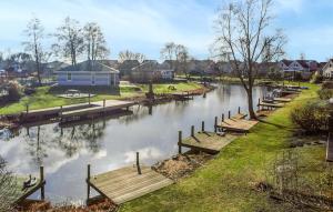 Nice Home In Makkum With Lake View