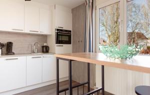 Nice Home In Makkum With Lake View