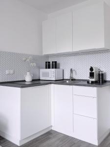 nestup - Zentrales Apartment mit Boxspringbetten, Smart-TV und ausgestatteter Küche