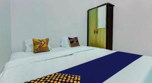 SPOT ON 91159 Kost Putrana Syariah