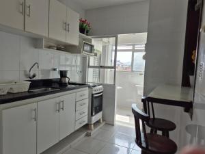 Apto Enseada Guarujá - Wi-Fi - Netflix