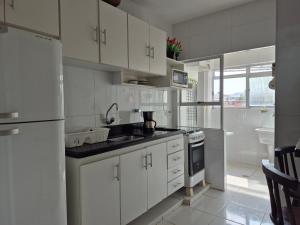 Apto Enseada Guarujá - Wi-Fi - Netflix