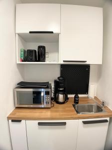 Urban Haven-Zentrum-3 Schlafzimmer-5 Einzelbetten-Waschmaschine