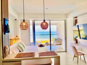 Beachfront Apartment - Pool - Jacuzzi - Wi-Fi