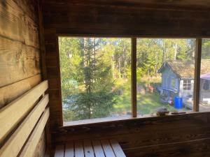 Cozy cottage in the woods near lake & sauna