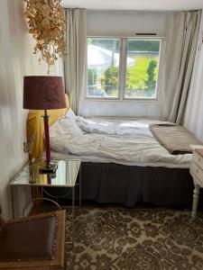 Cozy Guest Rooms in a Charming Båstad Villa, Prime Location near the Sea