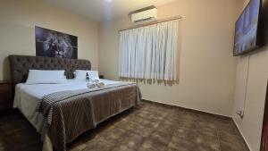 Quartos Refúgio com Vista e Piscina Compartilhada